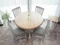 ROUND EXTENDING DINING TABLE FROM 106CM-145CM